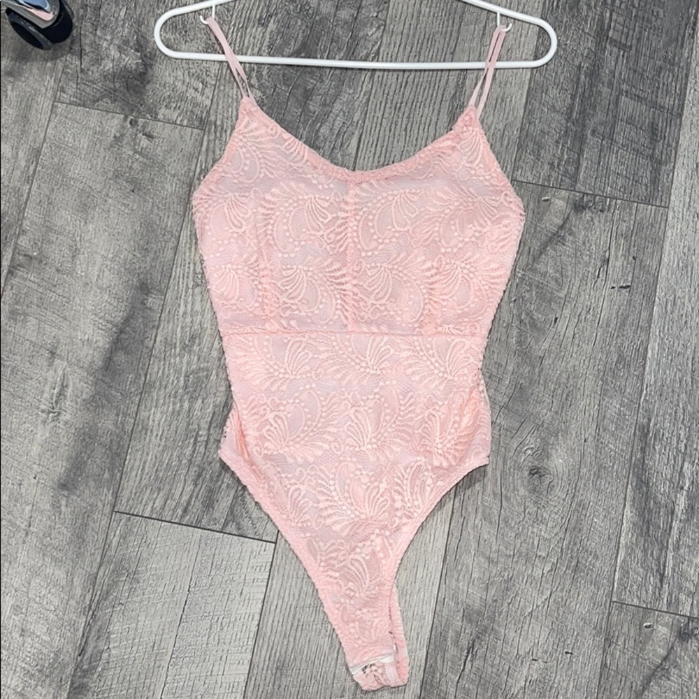 light pink body suit